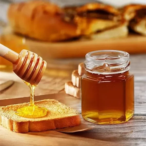 1.5Oz Mini Hexagon Glass Honey Jars with Wood Dipper & Bee Charms for Weddings & Parties - Image 7